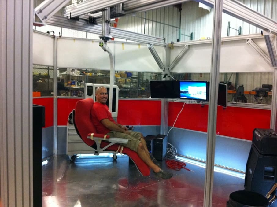 Jeremy sitting in the floating chair in the finished prototype.